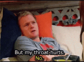 a man is laying on a bed with a bowl of soup and says but my throat hurts no