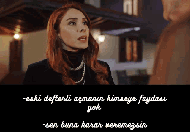 a woman with red hair is standing in front of a sign that says eski defterli acmann kimsiye faydasi yok