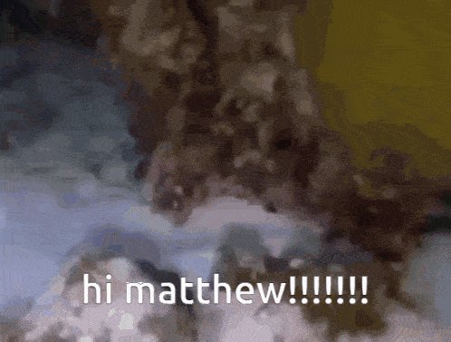 a blurred image with the words hi matthew written in white