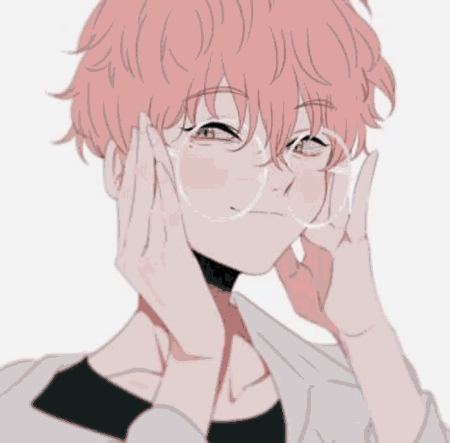 a boy with pink hair and glasses is holding his hand to his face .