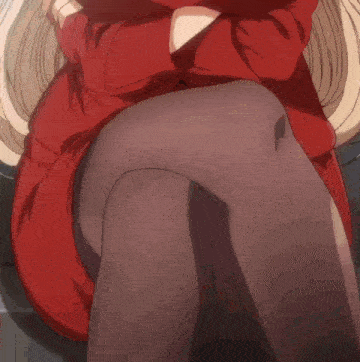 a woman in a red dress and black tights is sitting with her legs crossed