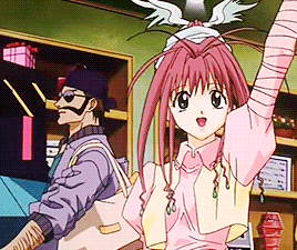 a girl with pink hair is standing next to a man with a mustache