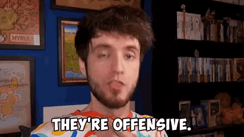 a man with a beard says they 're offensive in front of a map of hyrule