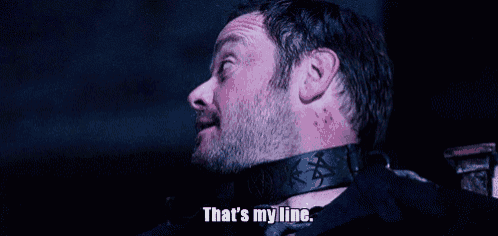 a man with a choker around his neck says that 's my line