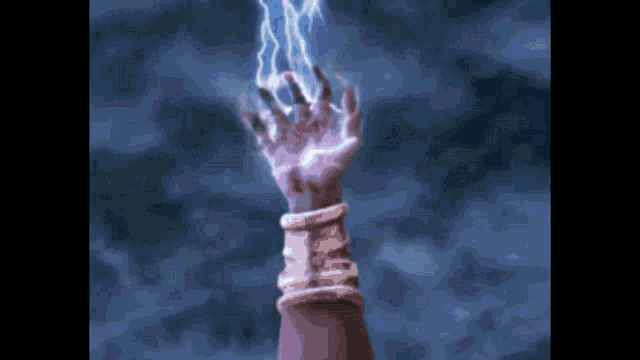 a person 's hand is reaching up towards a lightning strike