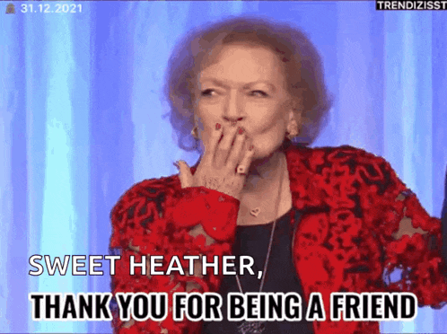 an older woman in a red jacket is covering her mouth with her hand .