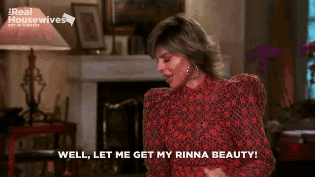 a woman in a red dress says well let me get my rinna beauty