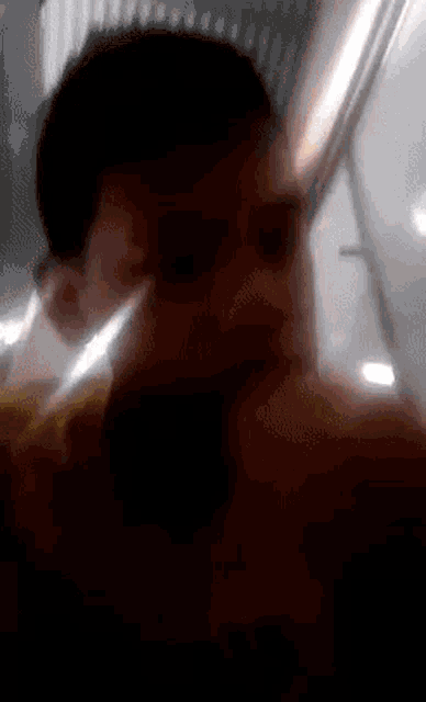 a close up of a child 's face with a blurry background .