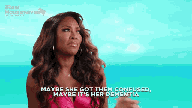 a woman in a pink bikini says maybe she got them confused