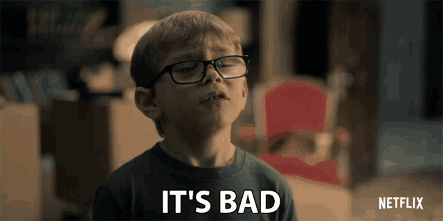 a boy wearing glasses says it 's bad