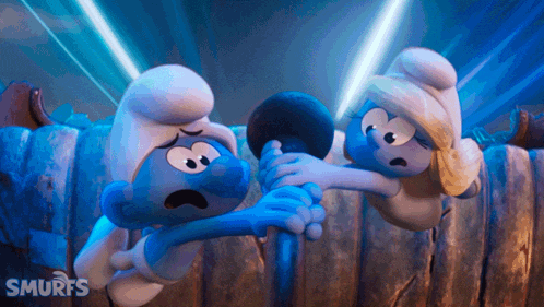 a couple of smurfs standing next to each other with the word smurfs on the bottom