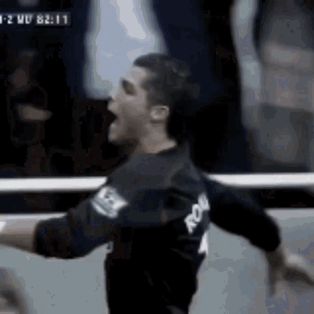 a man wearing a black jersey with the word ron on it