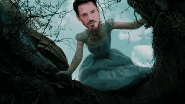 a man in a blue dress is standing in a hole