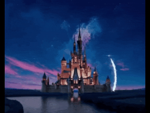 a picture of a castle with the words disney love below it