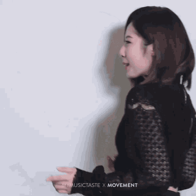 a woman in a black dress with the words make written on the bottom