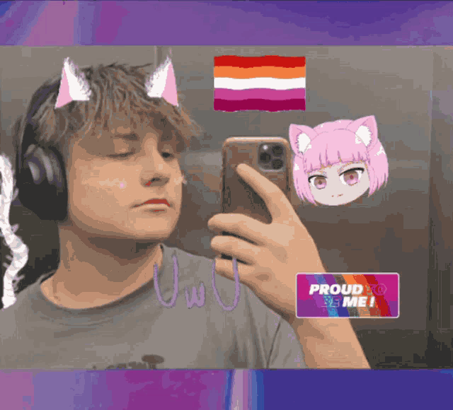 a young man taking a selfie with a sticker that says proud to be me