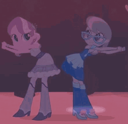 a couple of girls are standing next to each other on a pink surface .
