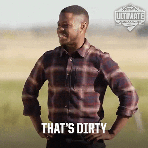 a man in a plaid shirt with his hands on his hips says " that 's dirty "