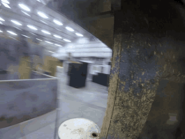 a blurred image of a building with a hole in it