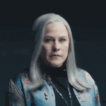 a woman with gray hair and the words is warranted below her