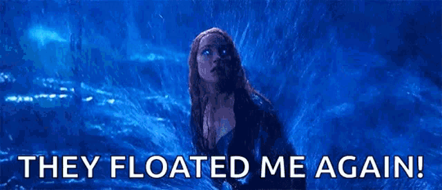 a woman is floating in the water and they floated me again