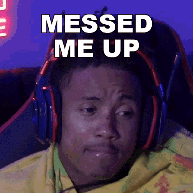 a man wearing headphones with the words messed me up written above him