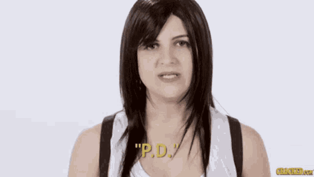 a woman wearing a wig says " downs " in a white tank top