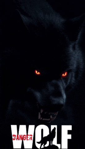 a black wolf with red eyes is on a poster that says wolf