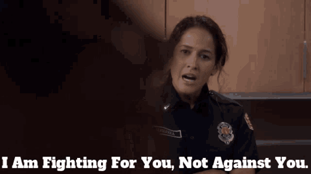 a woman in a police uniform says " i am fighting for you "
