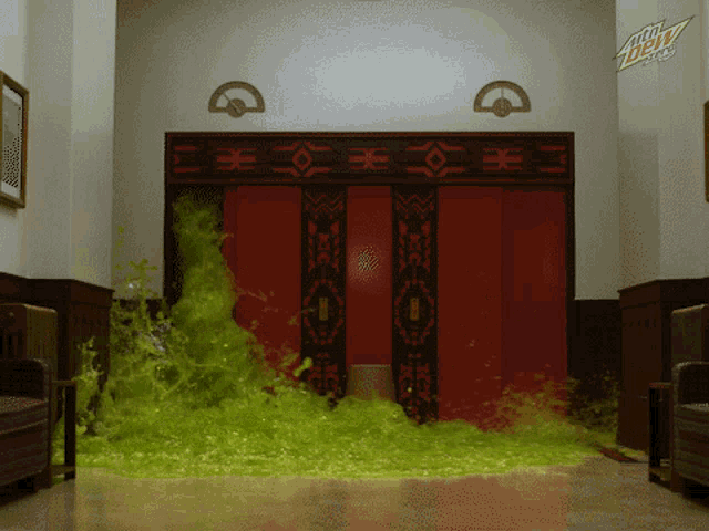 an advertisement for mtn dew shows a green liquid coming out of an elevator