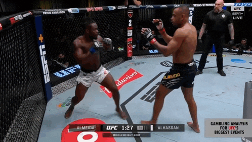 a boxing match between almeida and alhassan is being broadcast on espn