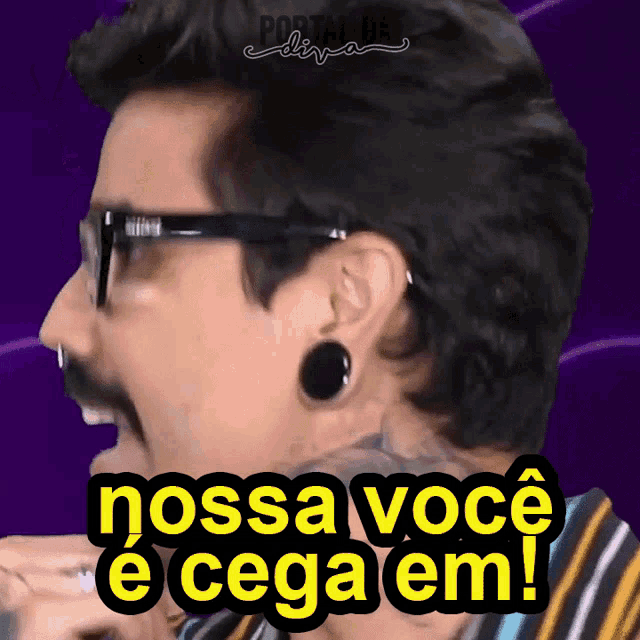 a man with a mustache and glasses says nossa você e cega em