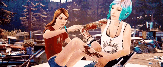a couple of girls are sitting on top of a car . one of the girls has a tattoo on her arm .