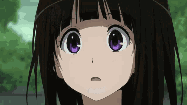 a girl with black hair and purple eyes looks surprised