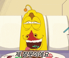 a yellow cartoon character is sitting at a table with a plate of food and a drink