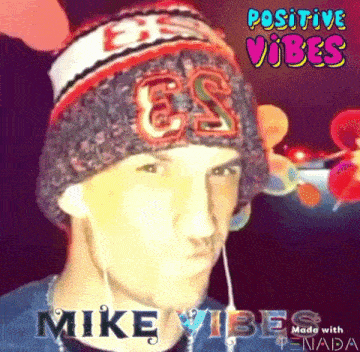 a picture of a man wearing a hat that says mike vibes on it