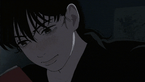 a close up of a person 's face with a smile on their face