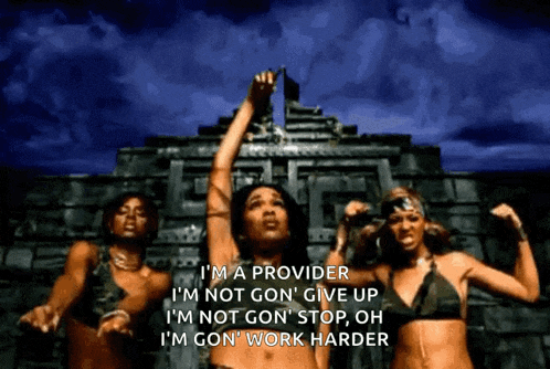 a group of women are dancing in front of a building and one of them is saying i 'm a provider