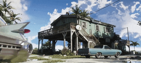 a blue truck is parked in front of a house
