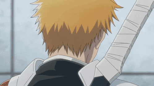 a close up of a person 's back with a sword behind them