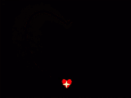 a red heart on a black background with sparkles