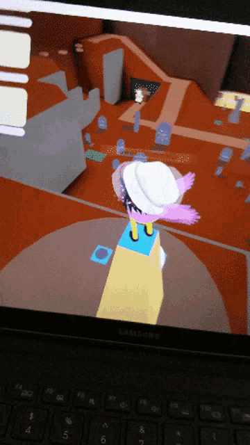 a samsung laptop displays a video game