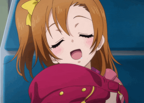 a girl with brown hair and a yellow bow on her head is holding a red bag