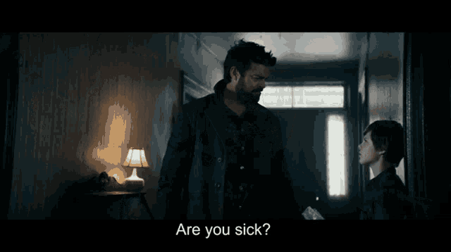 a man with a beard in a dark room says " went straight through me "