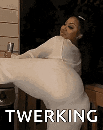 a woman in a white dress is doing a twerking while holding a can of beer .