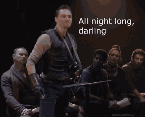 a man is holding a sword in front of a group of people with the words all night long darling written on the bottom