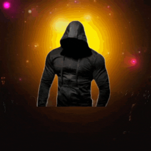 a man in a black hoodie with a yellow background