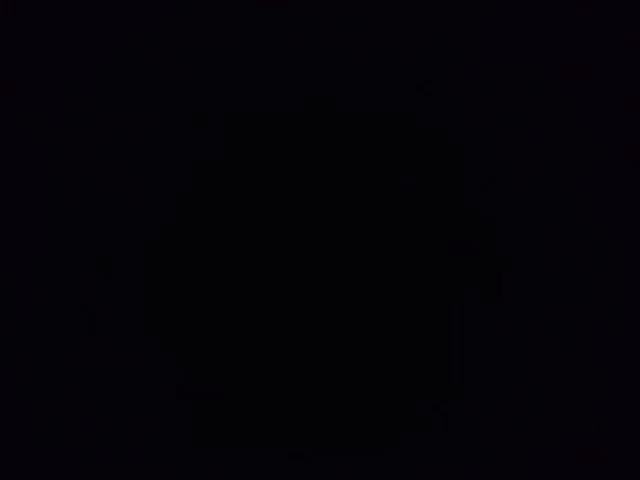 a black background with a few white dots on it .