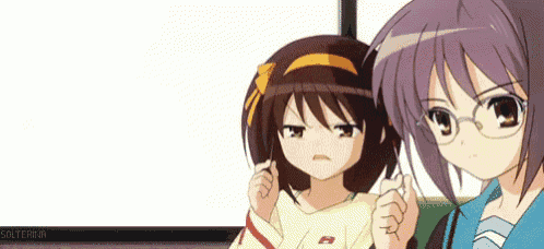 two anime girls are standing next to each other and one of them has glasses on .