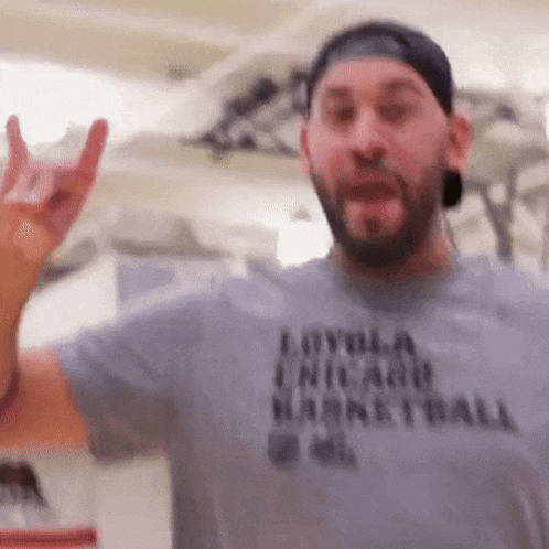 a man wearing a shirt that says loyal chicago basketball